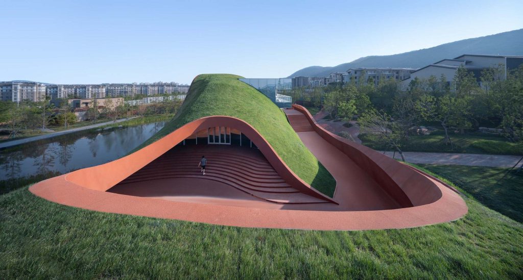 Zaha Hadid Architects Creates a Cultural Center with a Wavy Roof That Mirrors a River Zaha Hadid Architects Creates a Cultural Center with a Wavy Roof That Mirrors a River