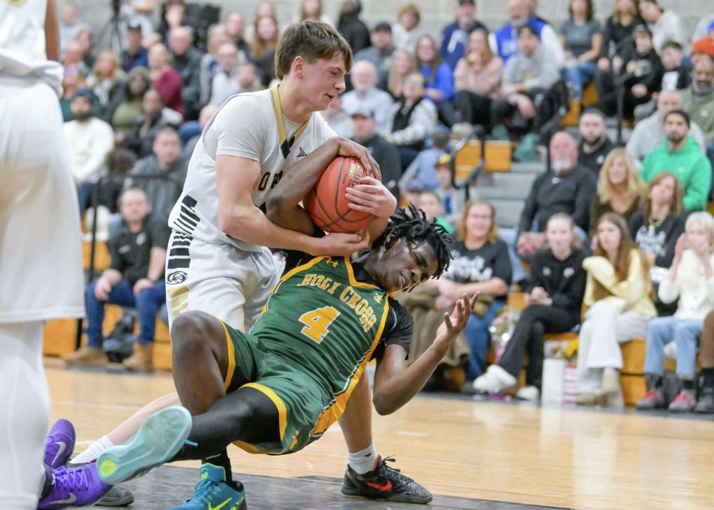 Priest Revitalizes Audience with Dance Routine during High School Basketball Game Halftime Event Priest Revitalizes Audience with Dance Routine during High School Basketball Game Halftime Event