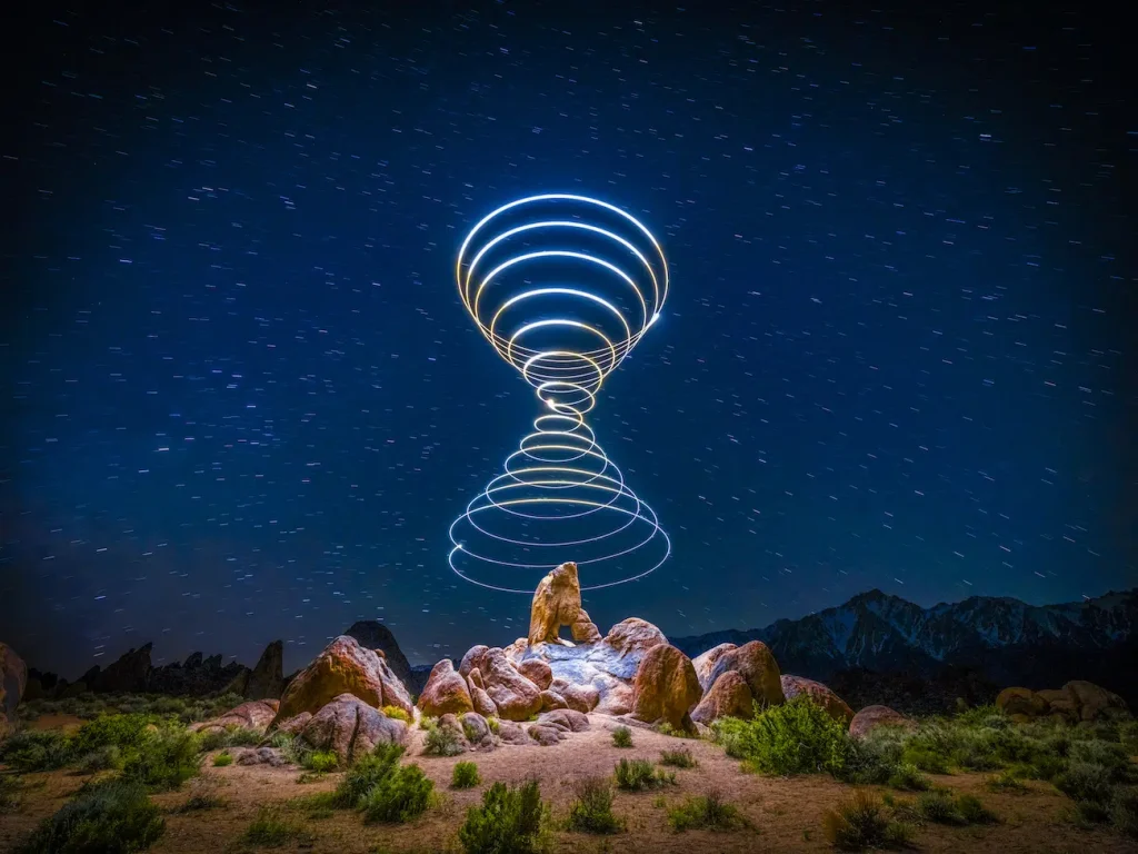 Photography of Twisting Light Cones Demonstrates Einstein’s Theory of Relativity in the Desert