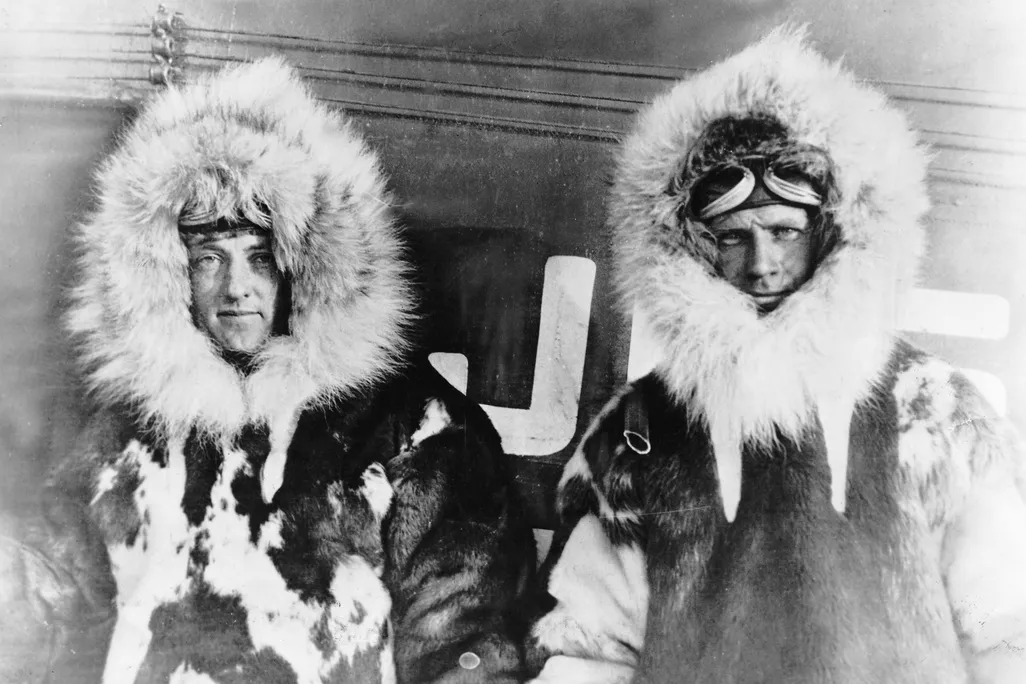 Richard E. Byrd (left) and Floyd Bennett (right) dressed in fur parkas, circa 1926