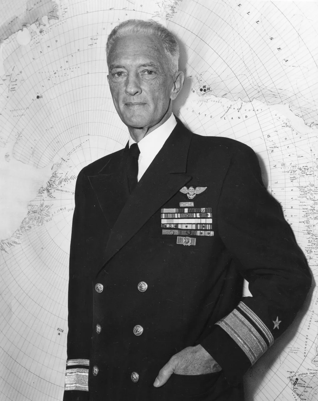 Richard Byrd in front of an Antarctic map on March 15, 1956