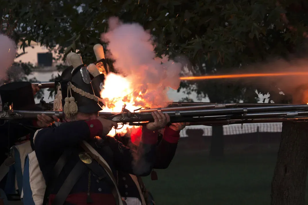 4 - Dressed in Colonial-period uniforms, men at Fort McHenry discharge firearms in honor of Defenders’ Day—Baltimore’s oldest holiday, which commemorates the city’s successful repulse of British forces in 1814.